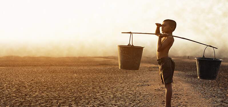 Access to water. Child carries buckets of water