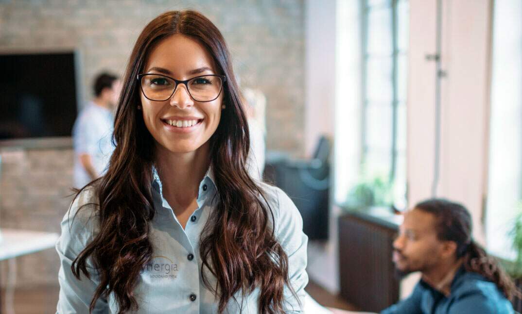 Woman with glasses smiling