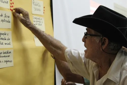a man takes part in activities for local development a man takes part in activities for local development