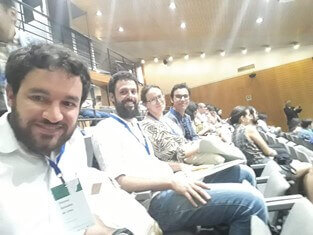 Synergia team at a conference on sustainability