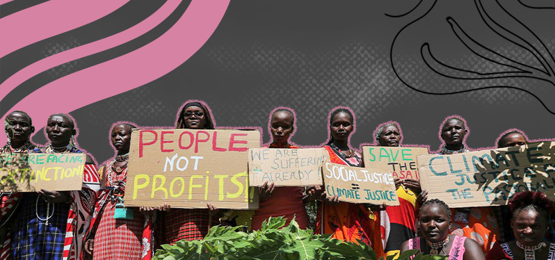 Justiça climática por elas - mulheres negras com cartazes de protesto. Foto EPA 