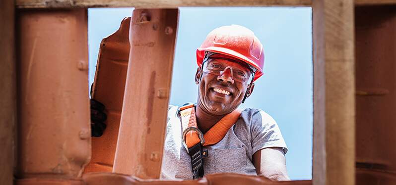 Man in the workplace. Decent work. Photo: Adobe Stock